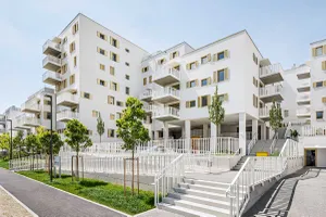 Rivus Vivere urban neighbourhood, white facade with plaster and brick slips from Sto