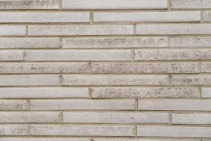 Close-up Fassadenfläche mit Klinkerriemchen, Wohn- und Geschäftshaus Neue MItte Porz