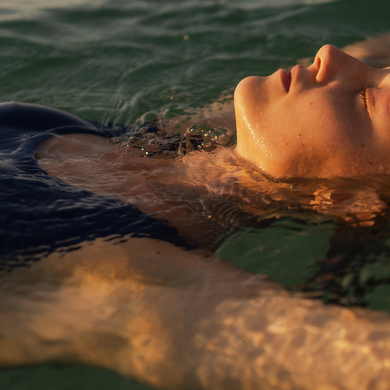 Woman floating in water