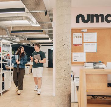 Numan employees walking through office