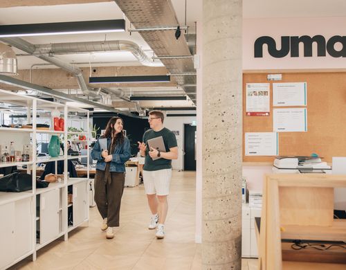 Numan employees walking through office