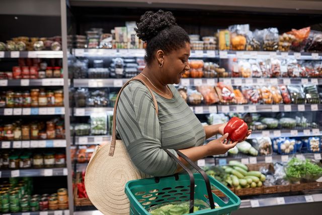 woman buying fruit