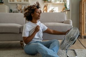 woman having hot flush