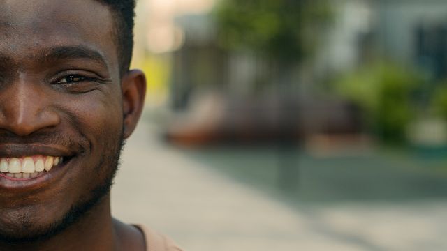 smiling man blur