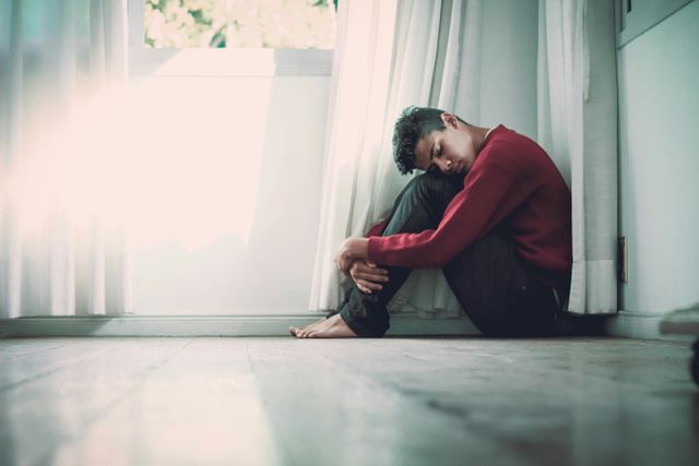 man-depressed-sitting