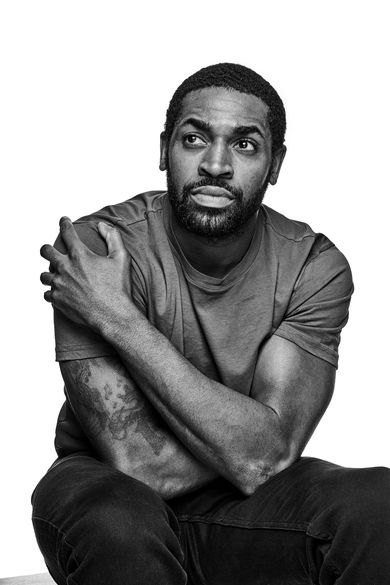 Man holding shoulder