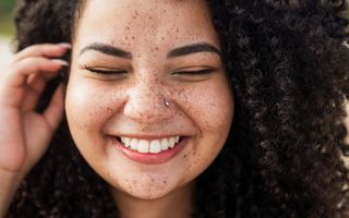 happy woman with freckles