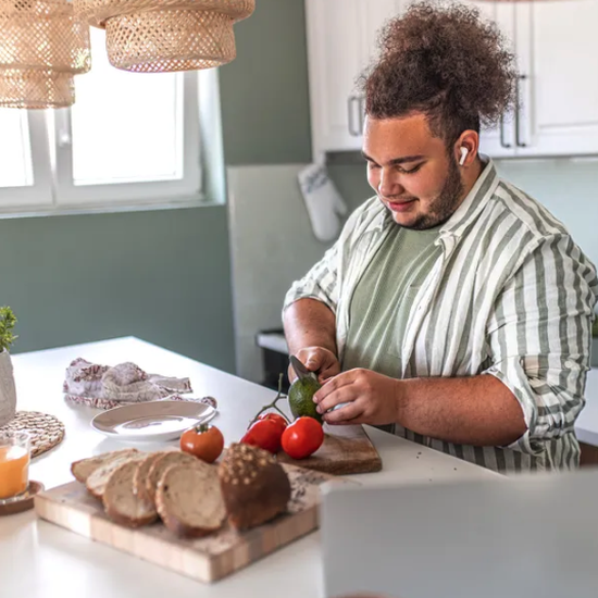 Man chopping vegetables