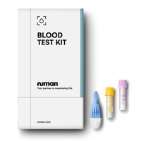 Blood test kit packaging with two vials and a lancet beside it