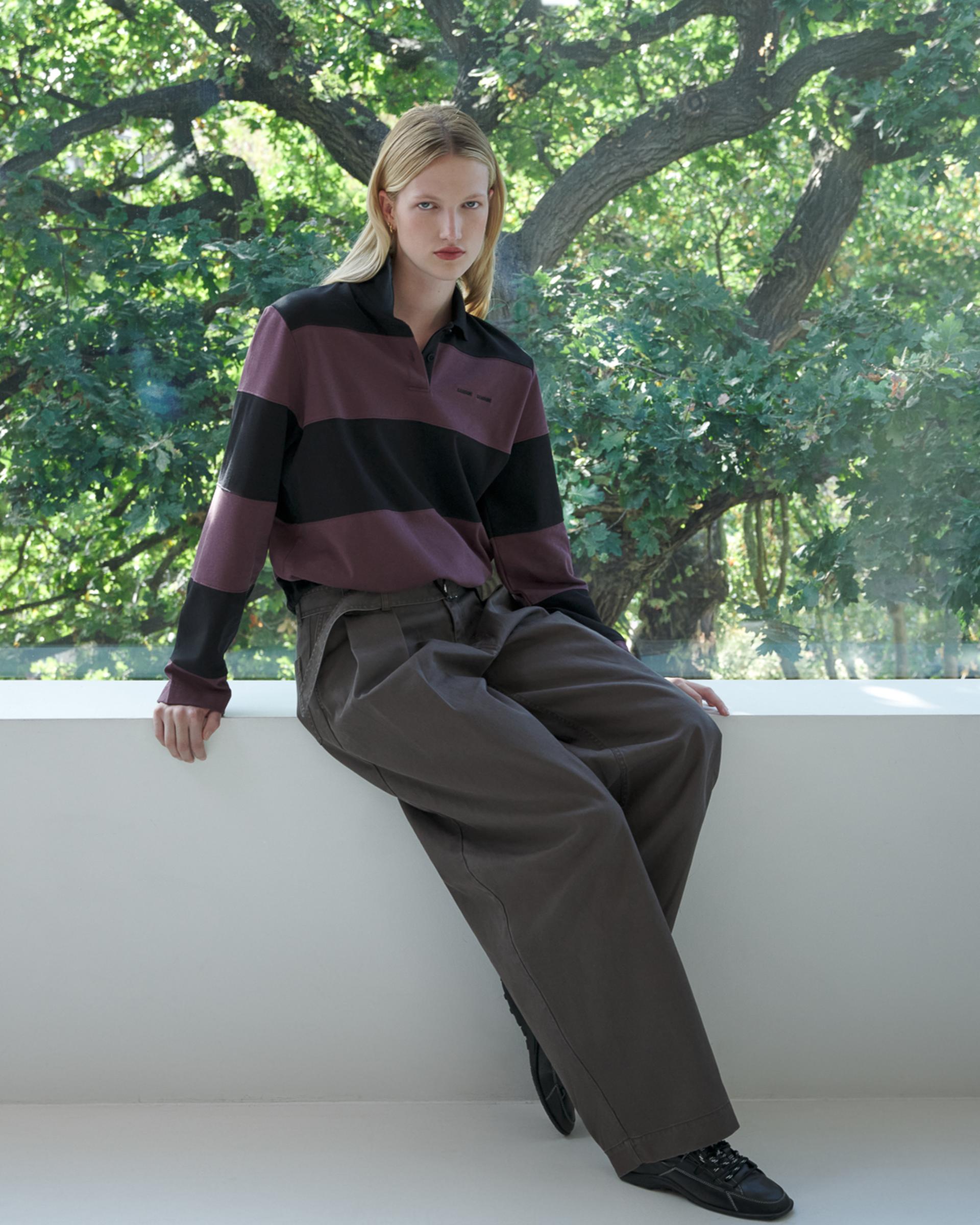 A model in layered autumn clothing from the END. and Samsøe Samsøe campaign