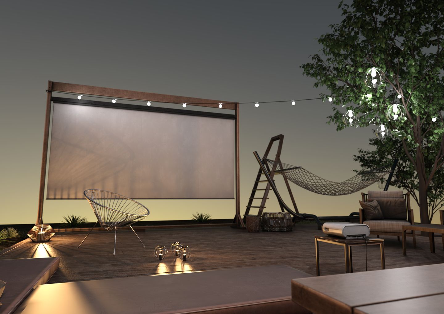 Freiluftkino mit Leinwand, Lichterkette und Sitzbereich bei Abendstimmung Vac1 via Getty Images