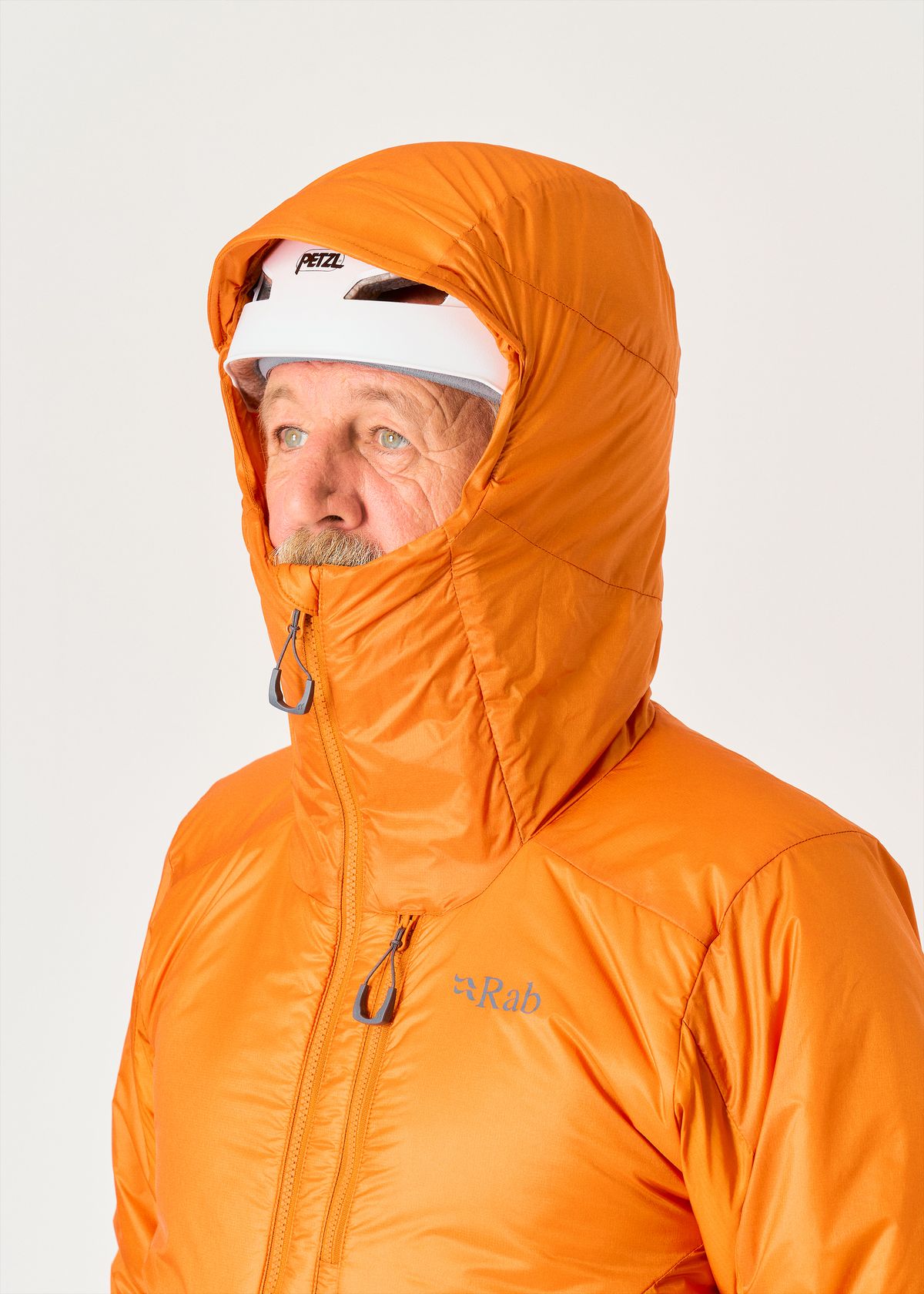 Adjustable helmet-compatible hood   