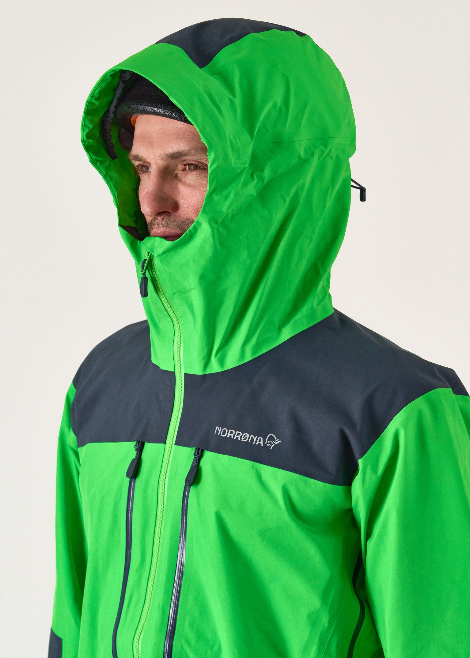 Adjustable helmet-compatible hood    