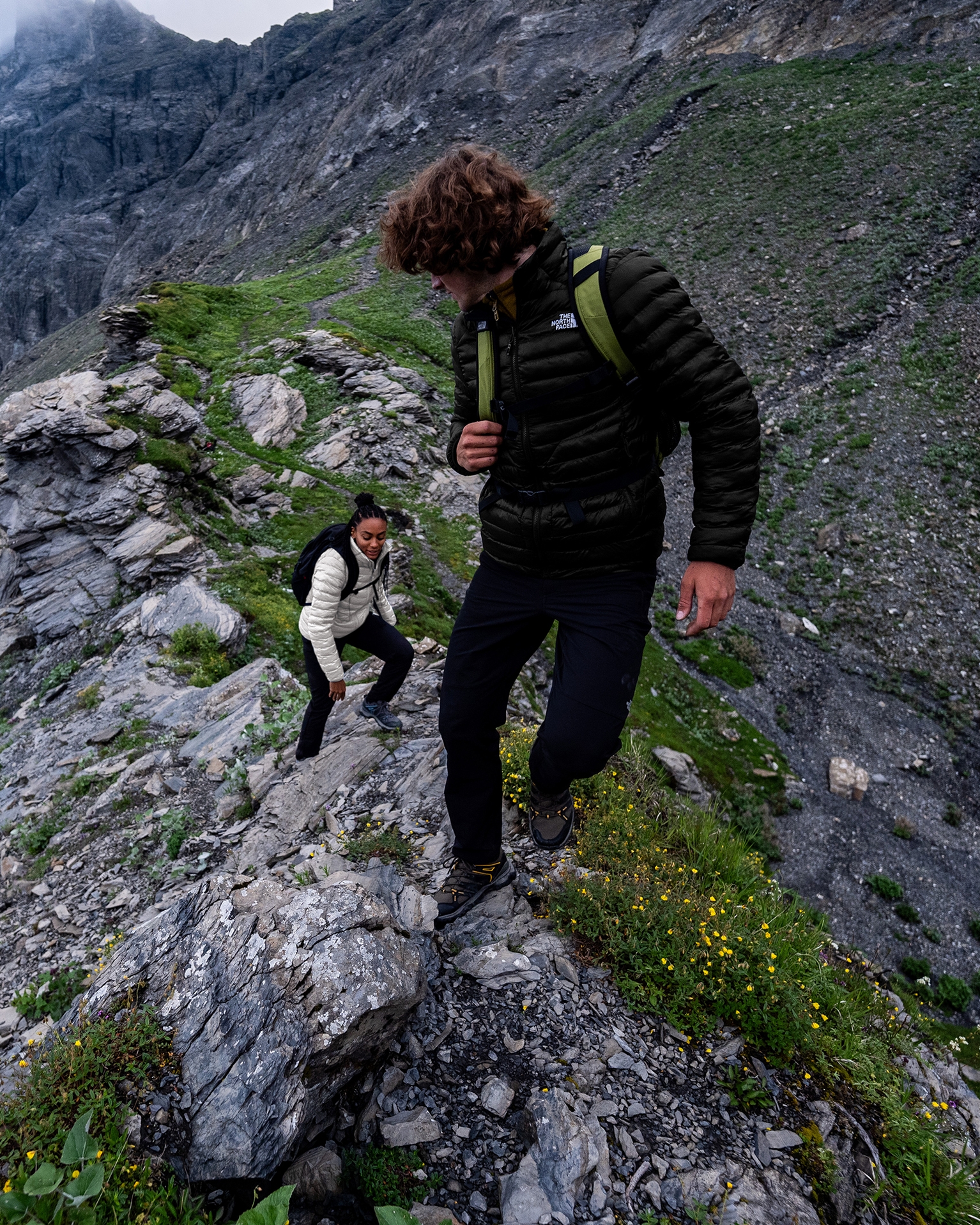 Two hikers wearing The North Face clothing
