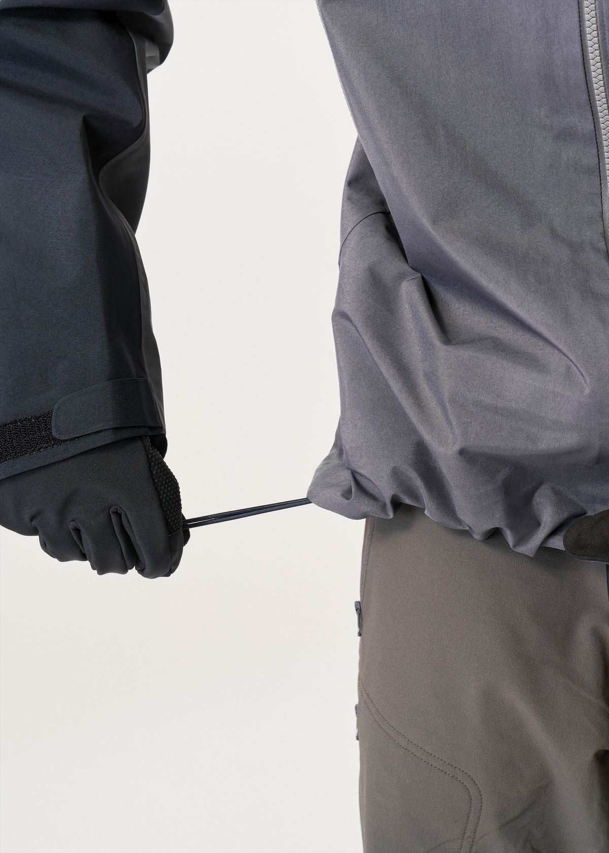 Dual-tether hem drawcords