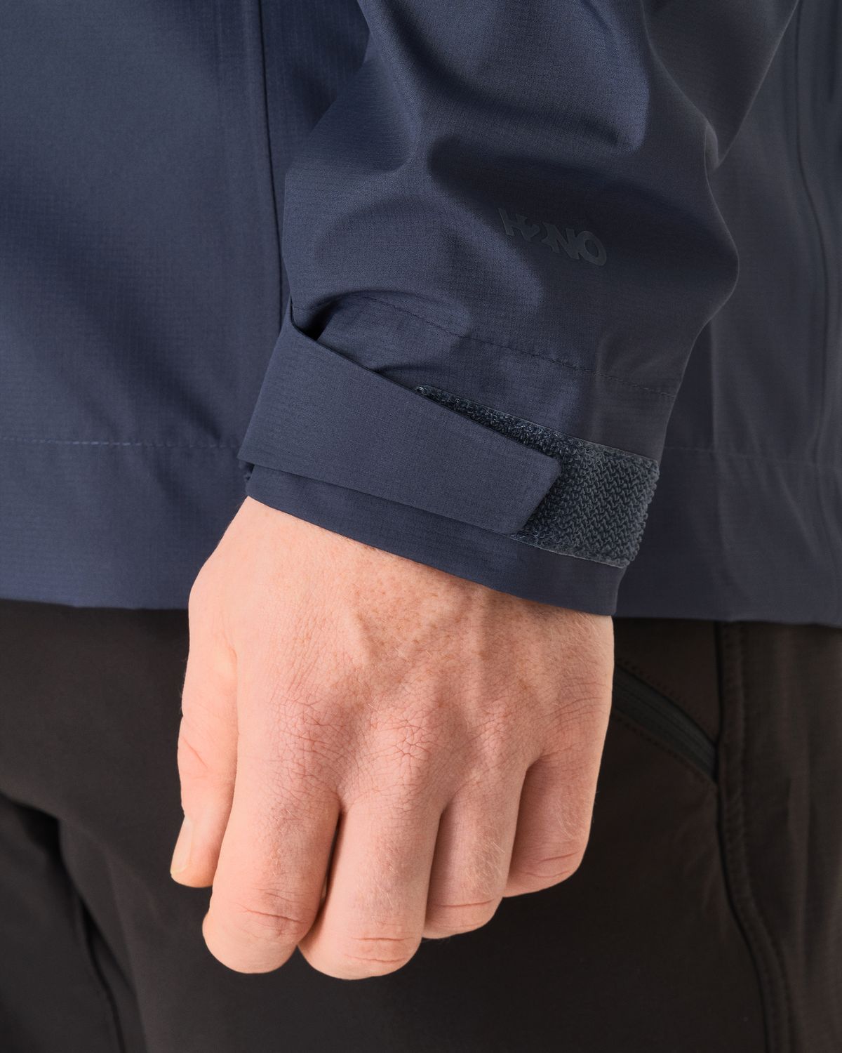 Hook-and-loop adjustable cuffs