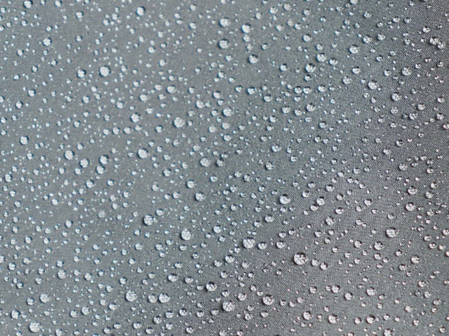close up of water beading on waterproof jacket