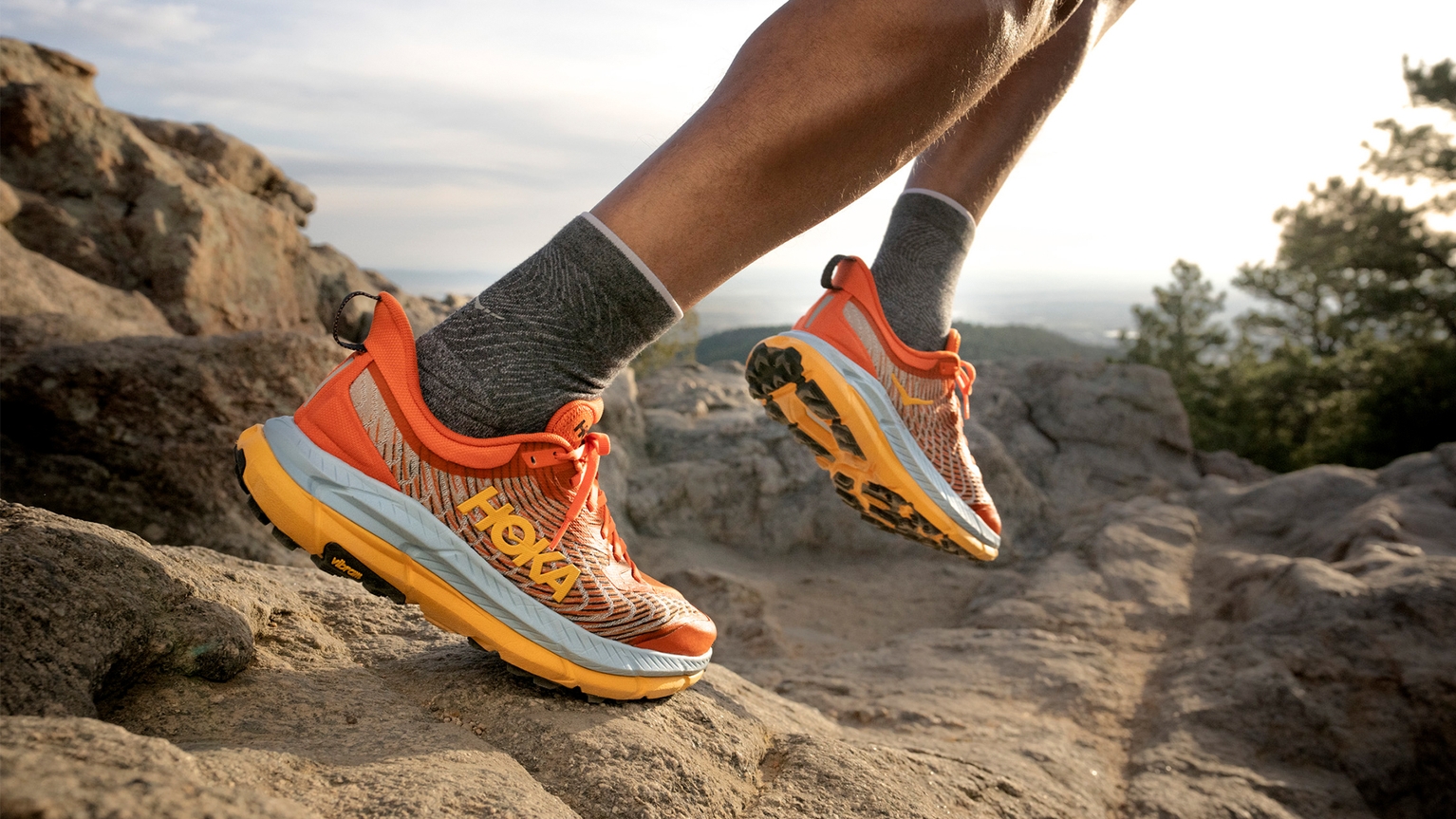 Person wearing HOKA mafate speed running shoes