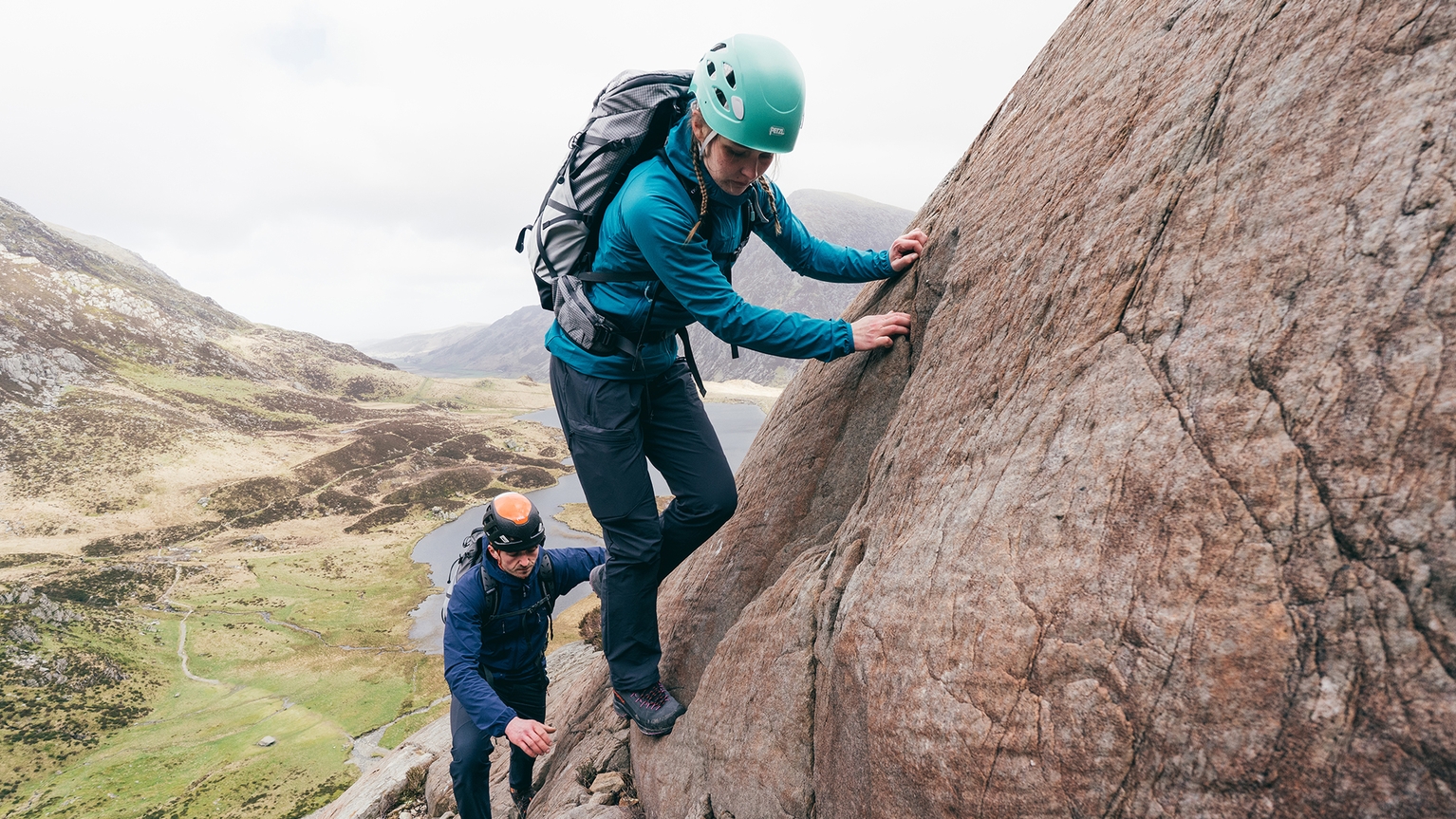 two people scrambling
