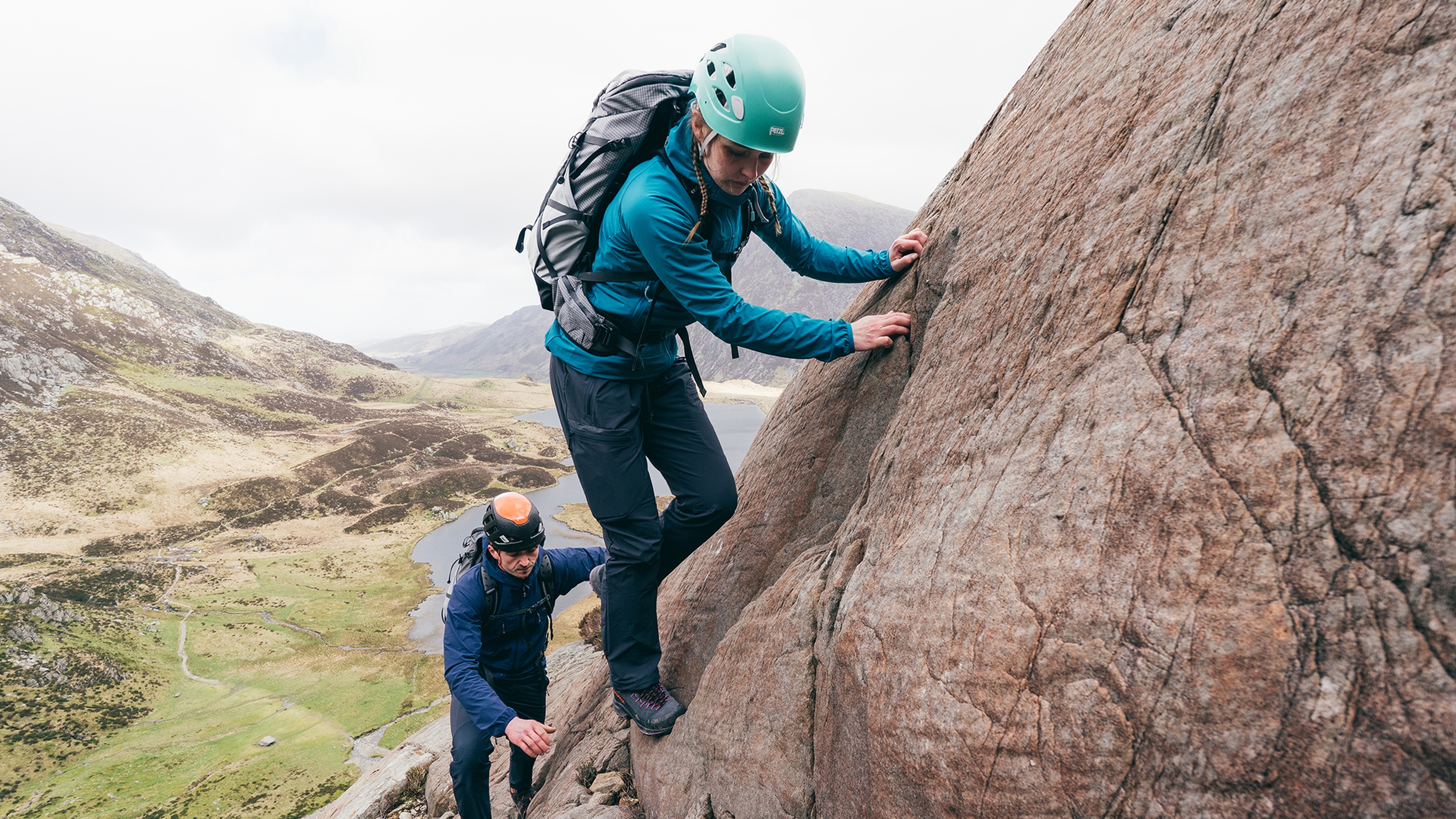 two people scrambling