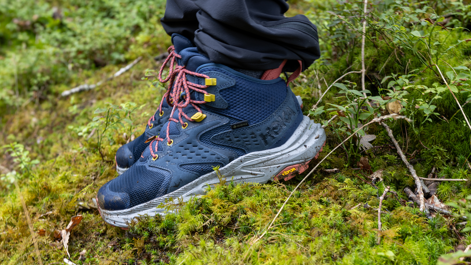 Person wearing HOKA anacapa walking boots