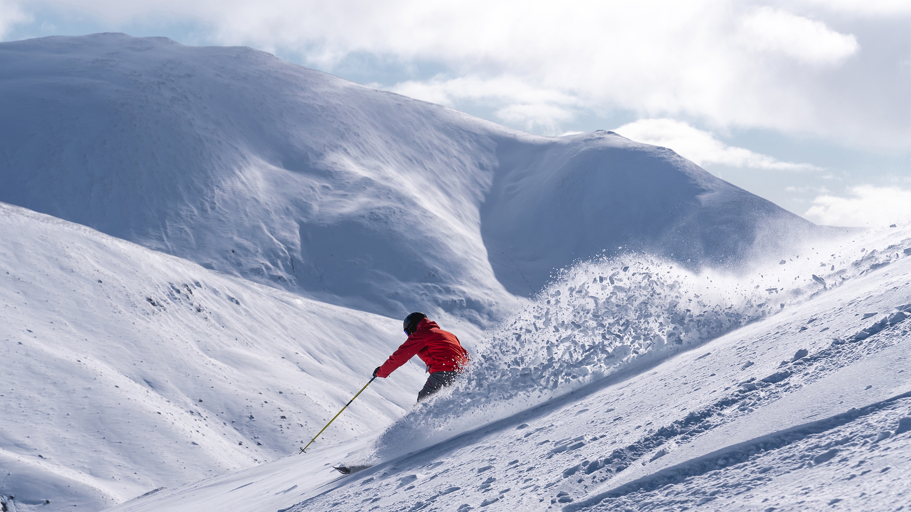 person skiing in scotland