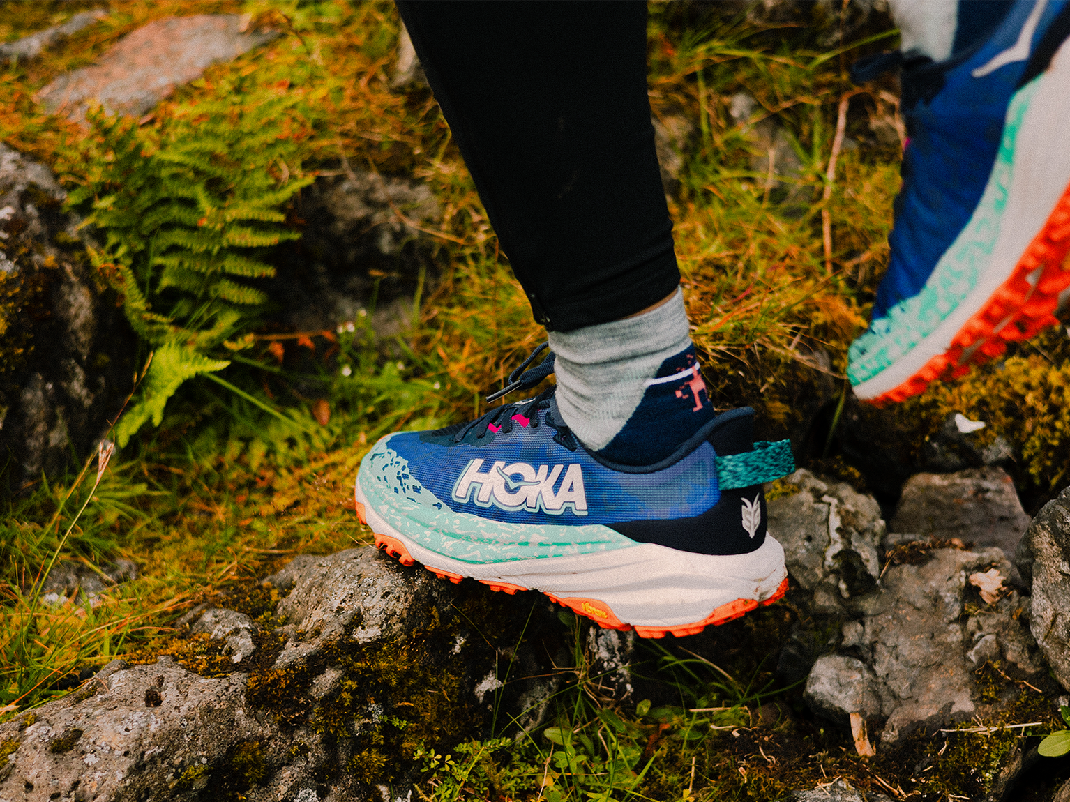 runner wearing hoka and running socks