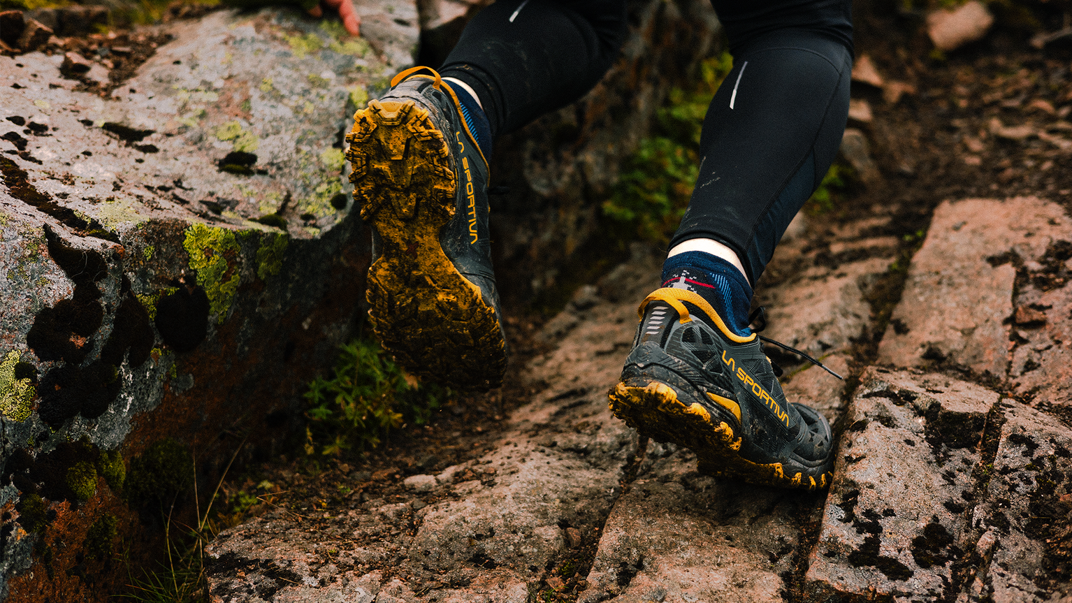 close up of runner wearing running shoes