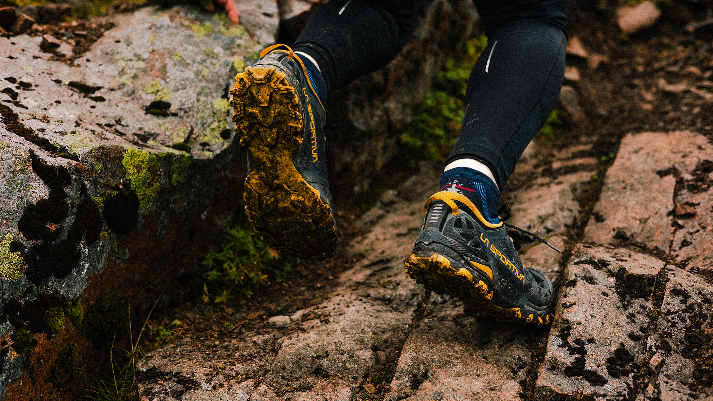 close up of runner wearing running shoes