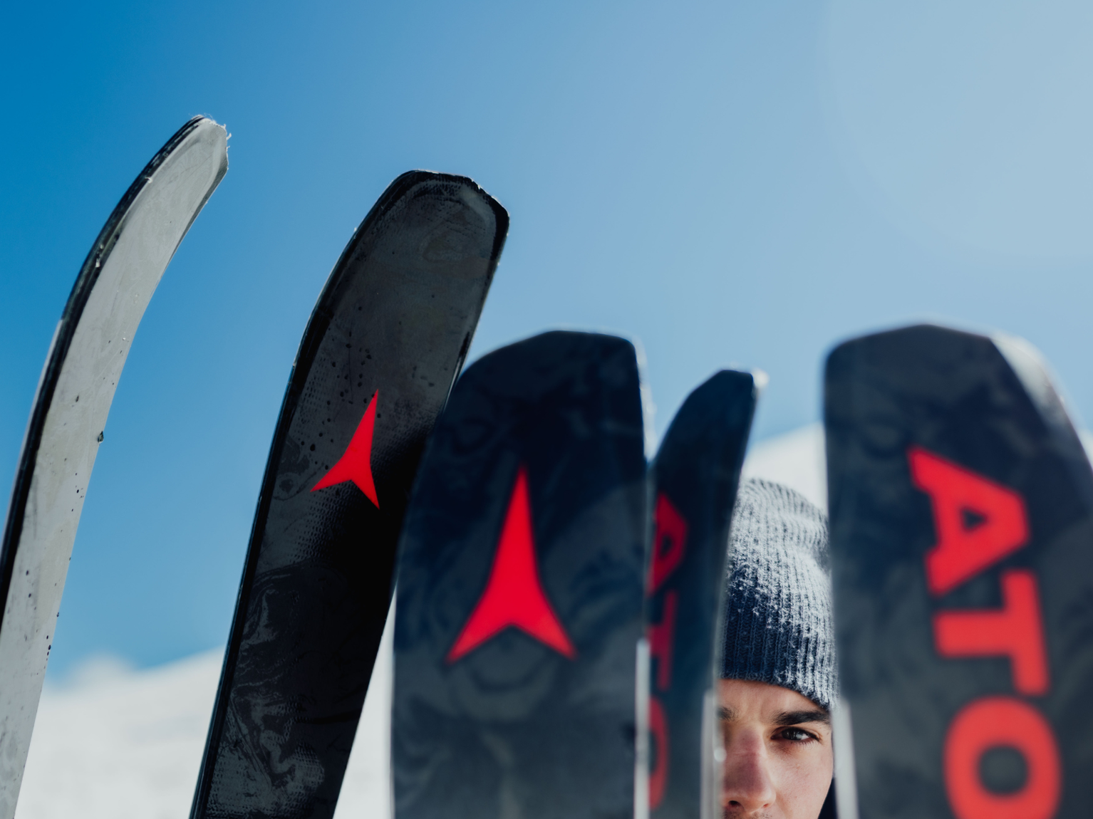 Atomic Bent Decode ski on a ski rack in the snow