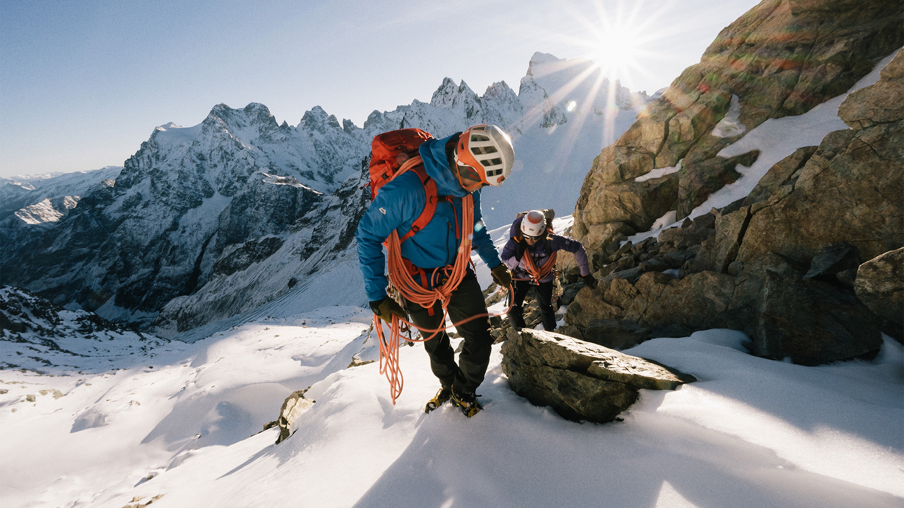 Two people winter climbing