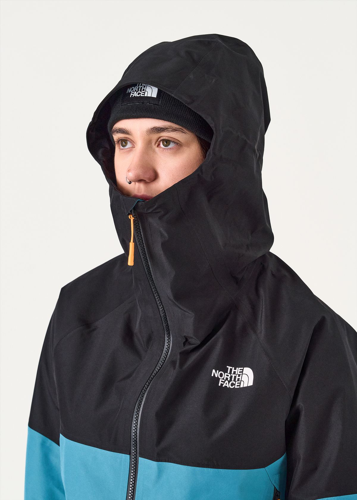 Adjustable helmet compatible hood