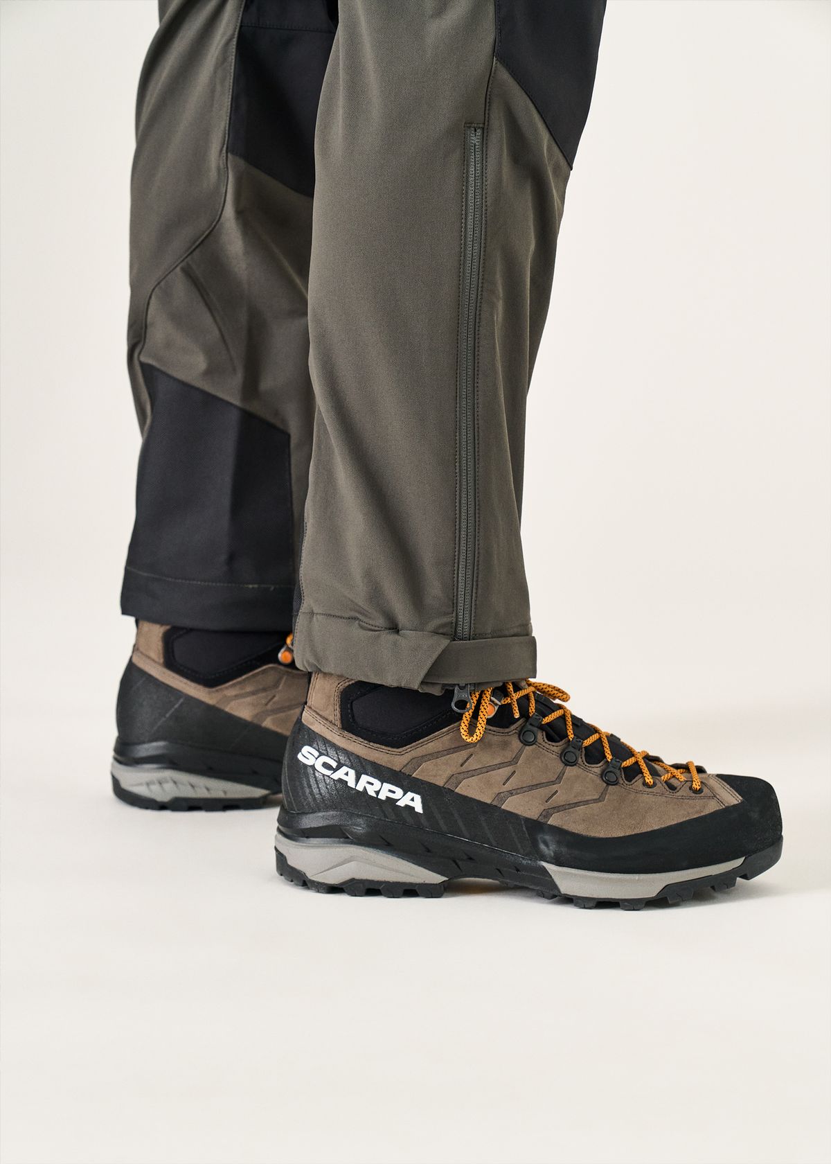 Two-way gusseted ankle zips