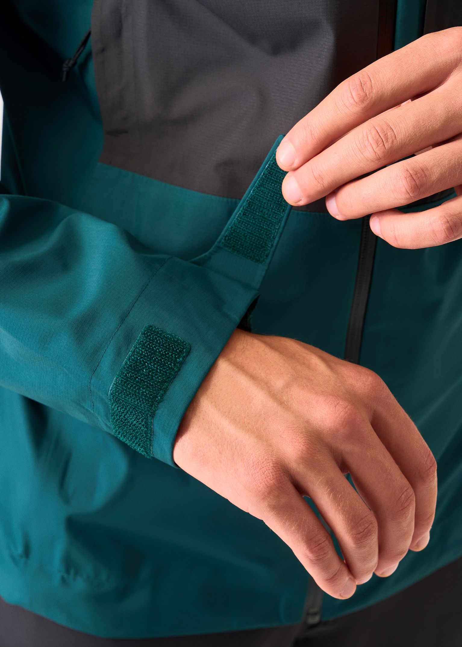 Hook-and-loop adjustable cuffs