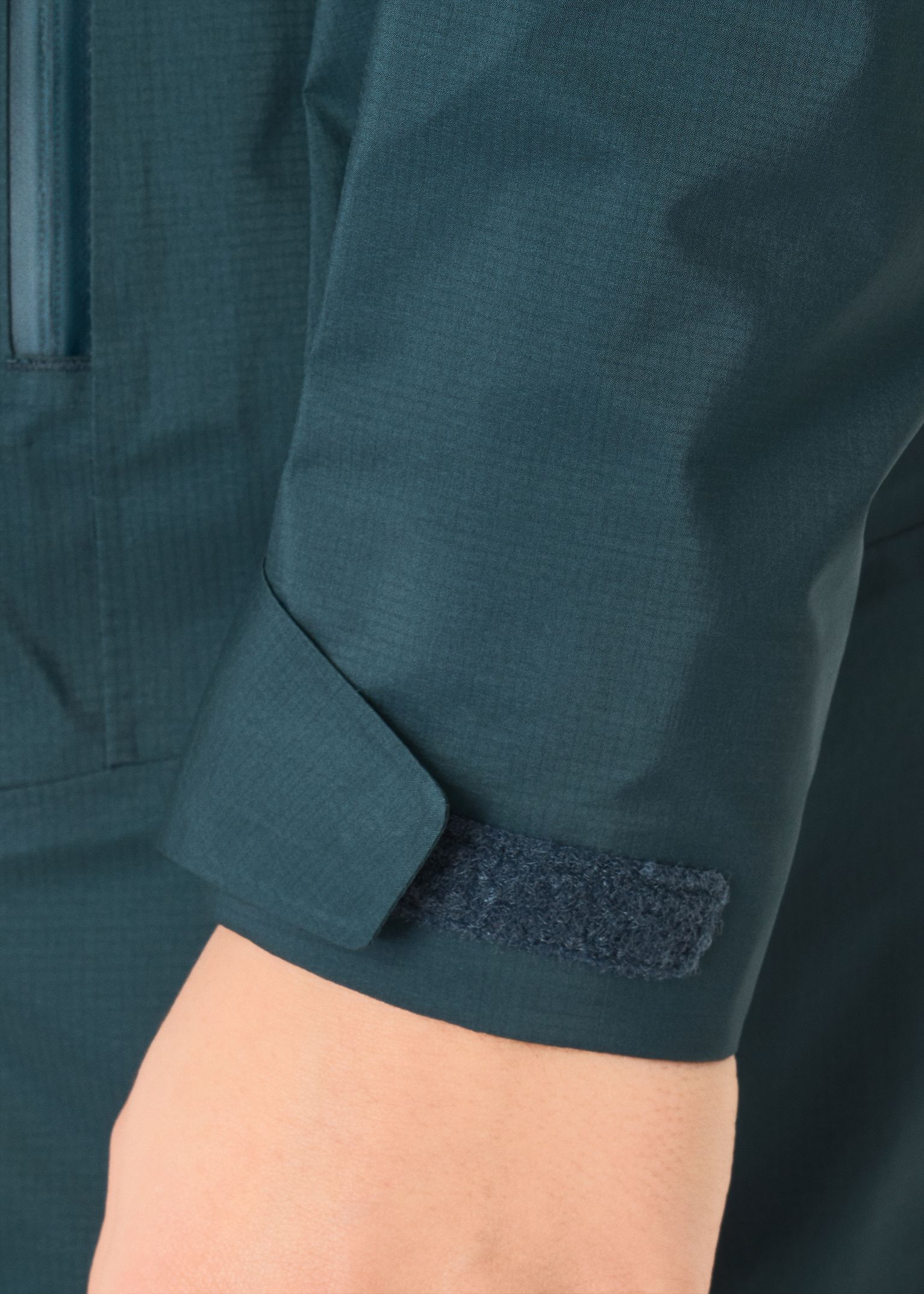 Hook-and-loop adjustable cuffs