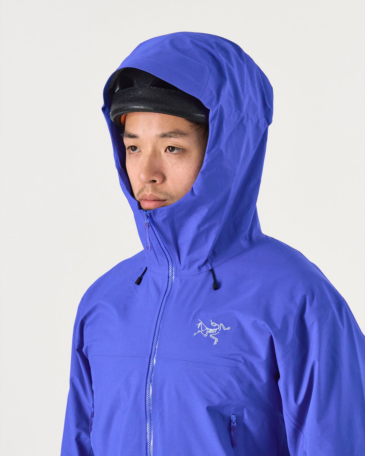 Adjustable helmet-compatible StormHood