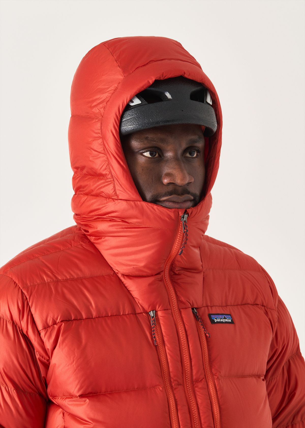  Adjustable helmet-compatible hood