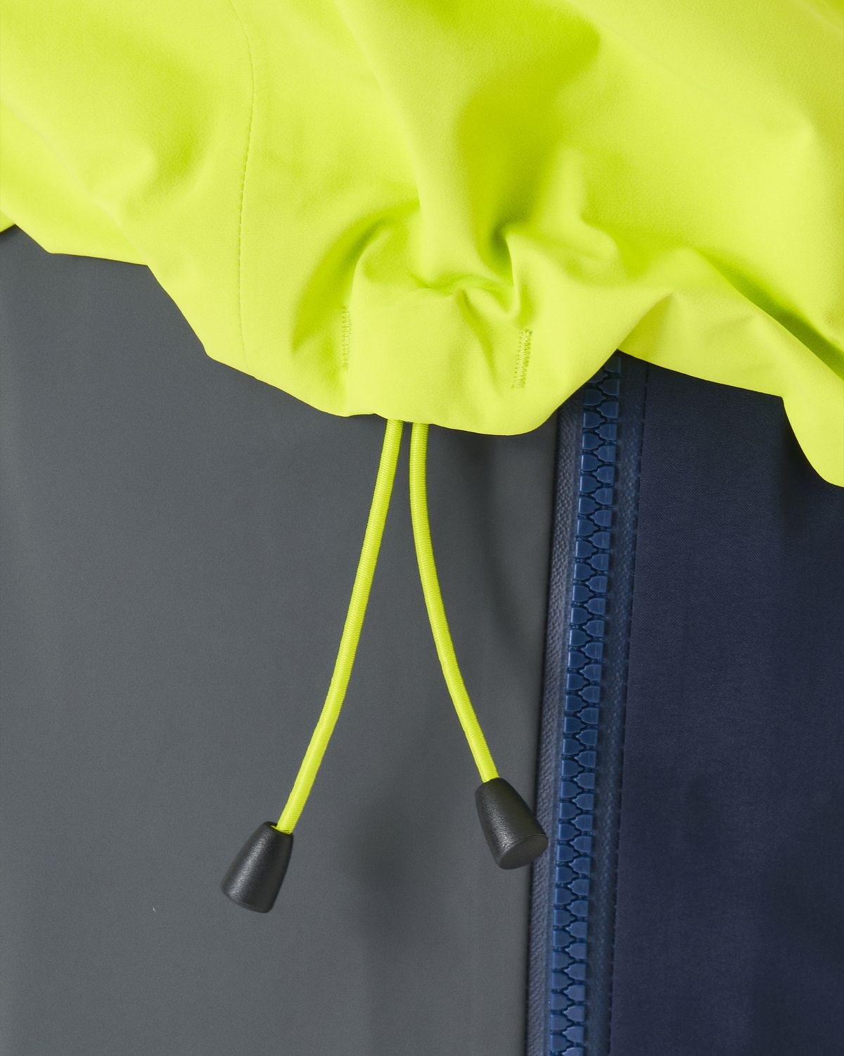 Dual-tether hem drawcords 