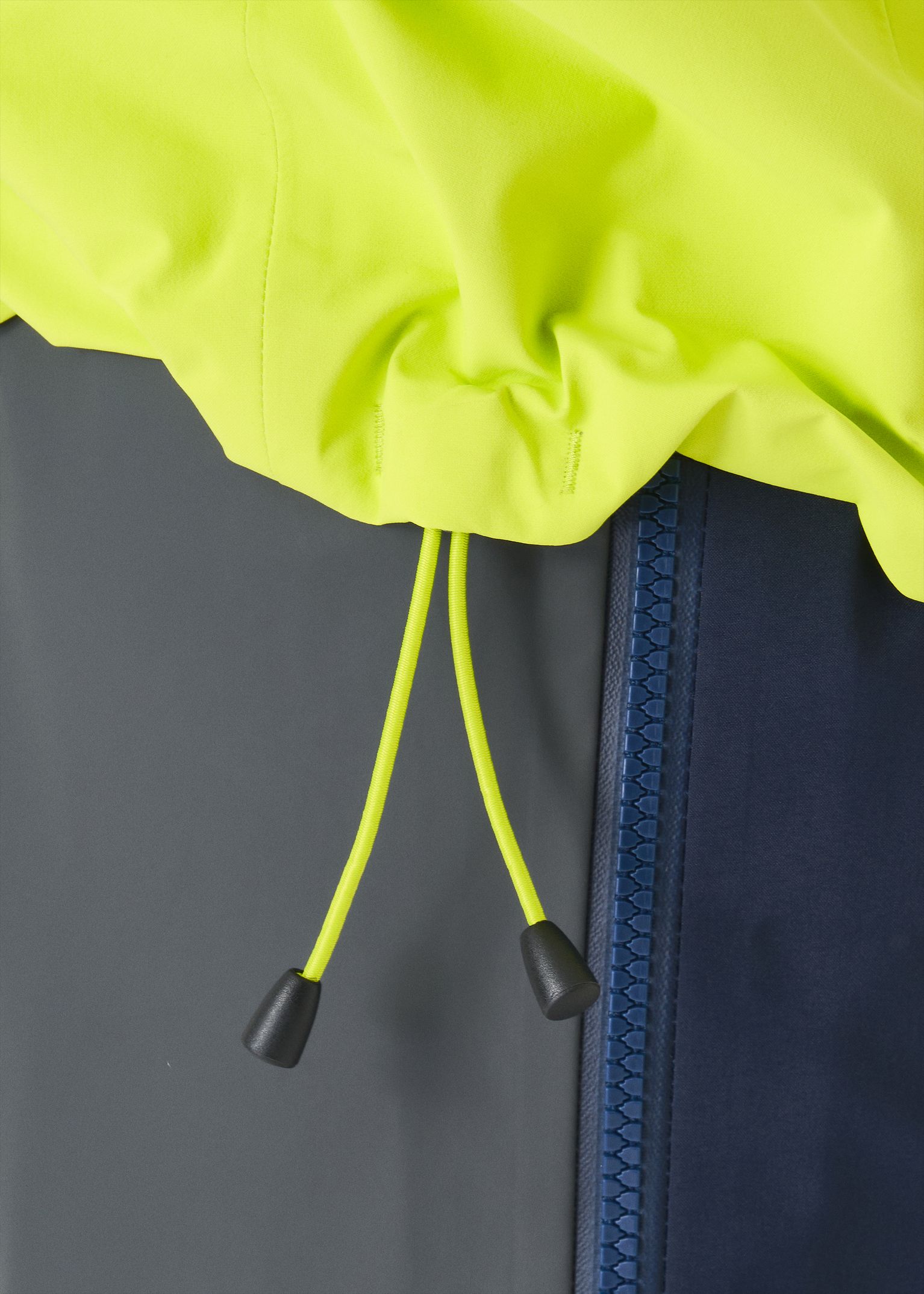 Dual-tether hem drawcords 