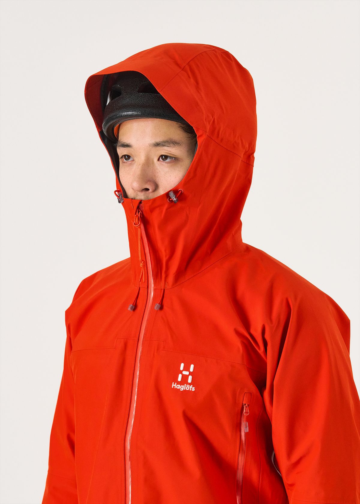 Adjustable helmet-compatible hood   