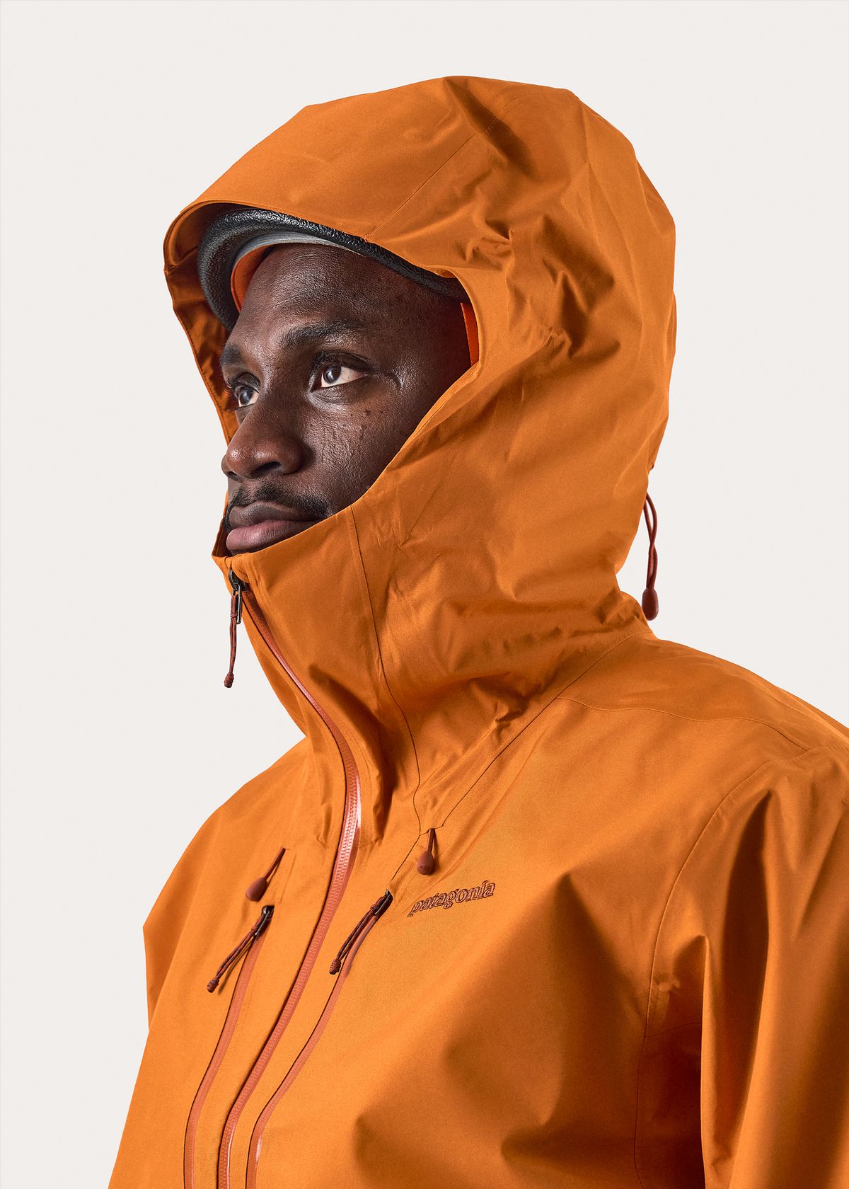  Adjustable helmet compatible hood 