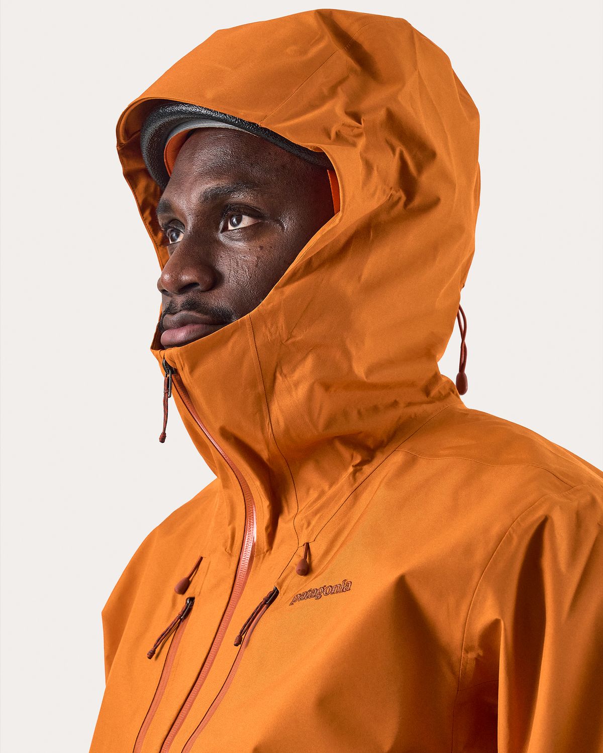  Adjustable helmet compatible hood 