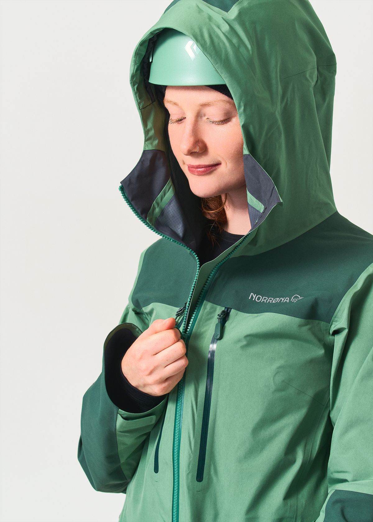 Adjustable helmet compatible hood