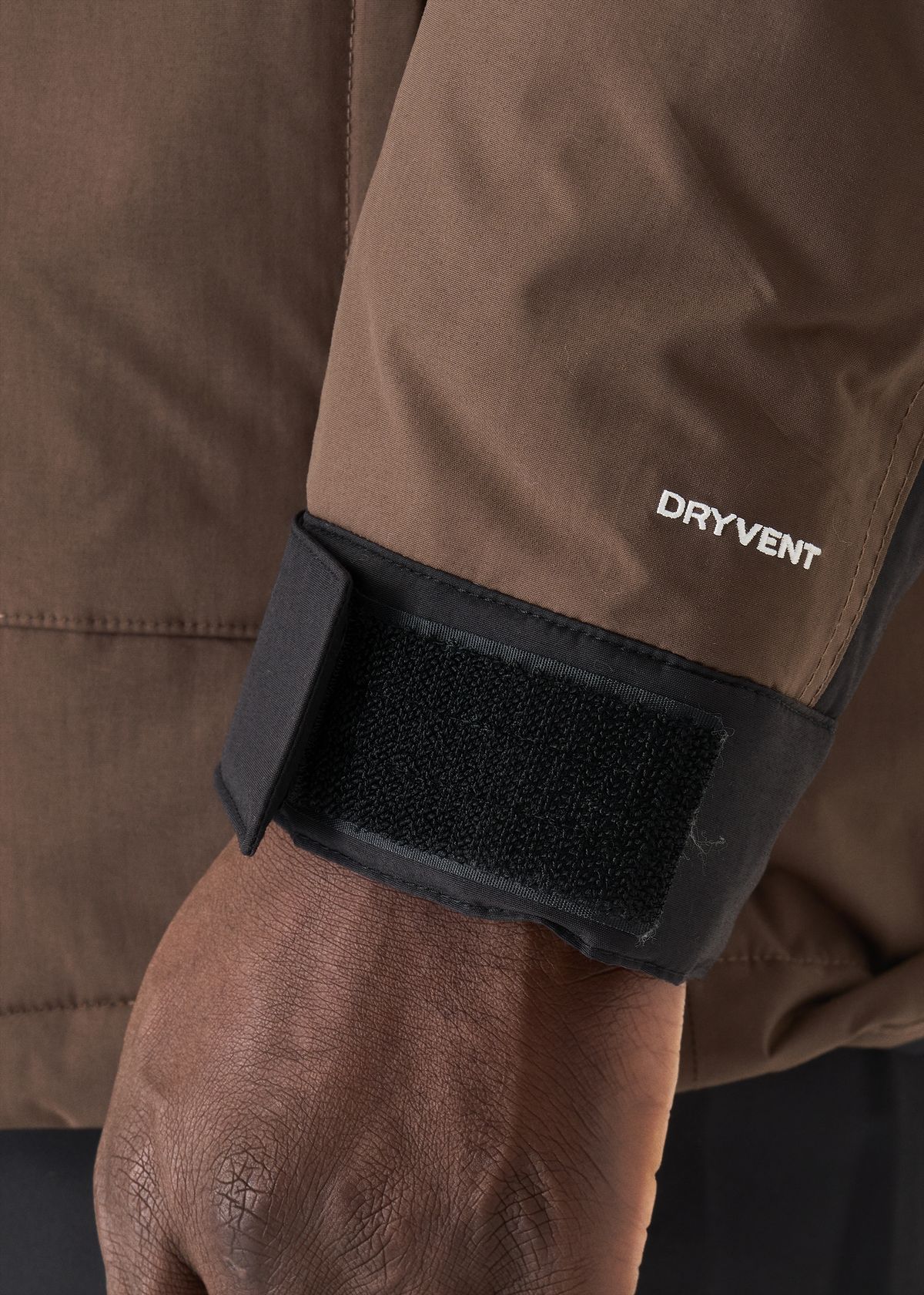 Adjustable hook-and-loop cuffs