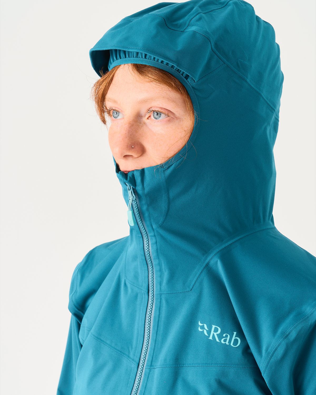 Adjustable hood with stiffened peak  