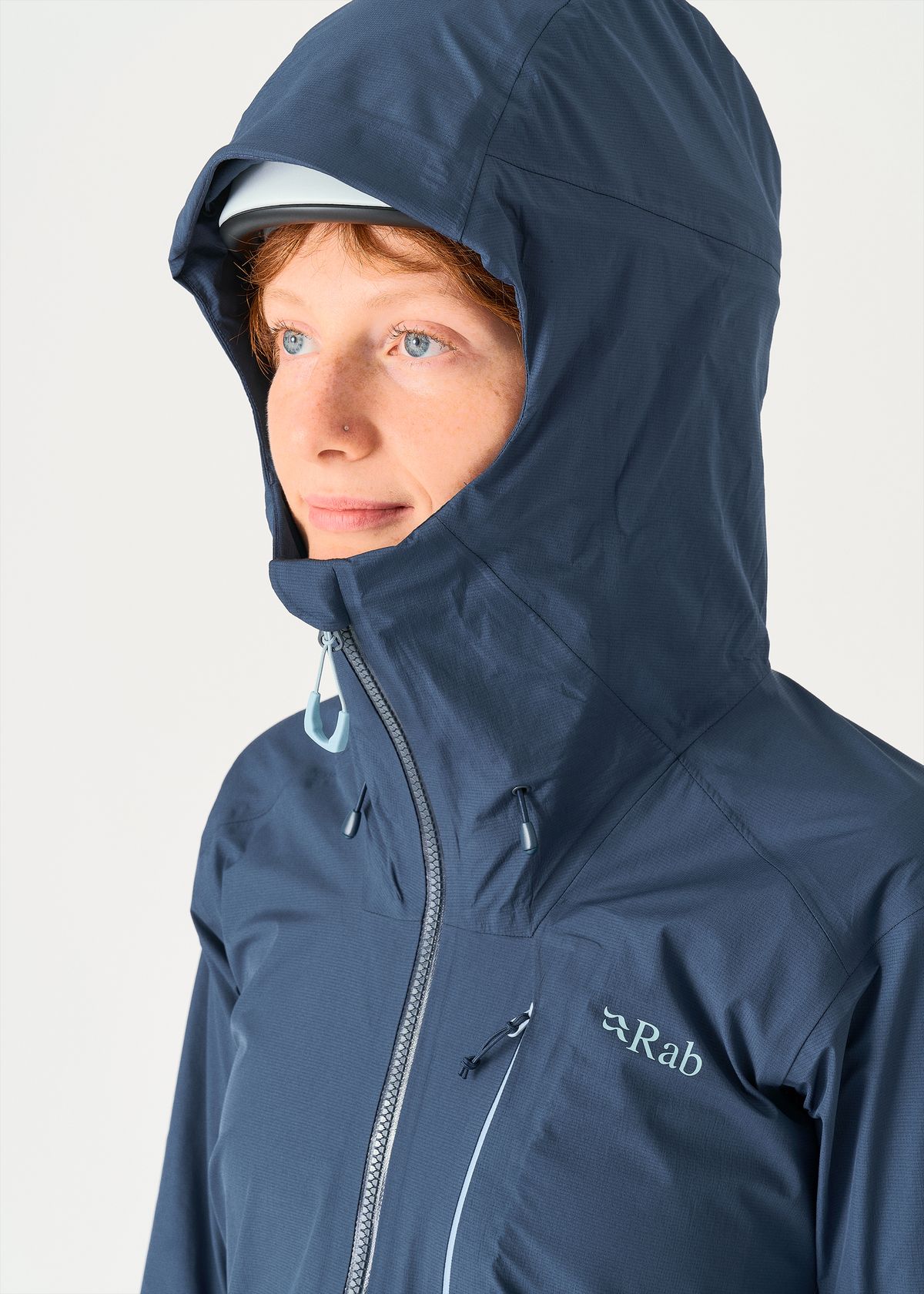 Adjustable helmet compatible hood      