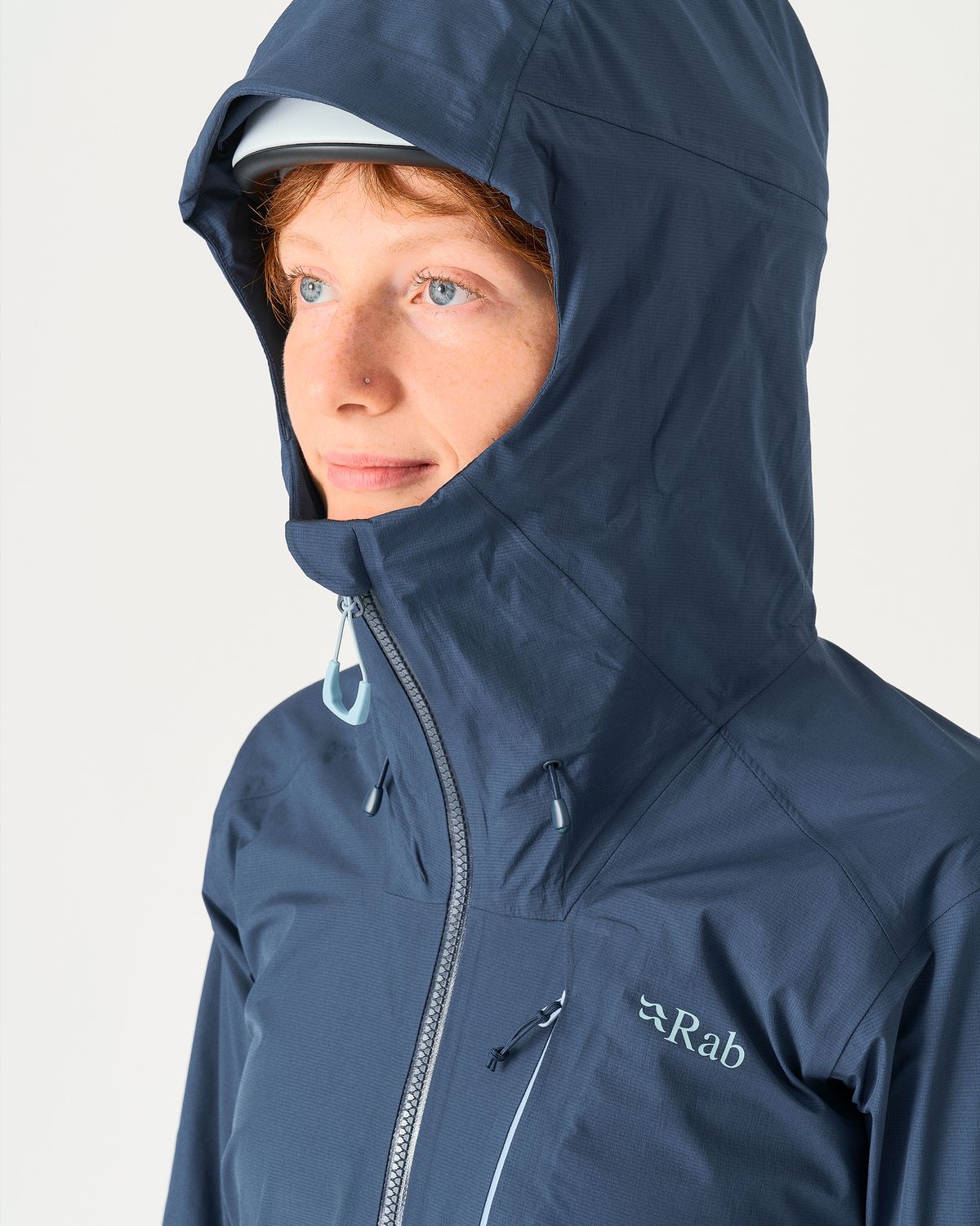 Adjustable helmet compatible hood      