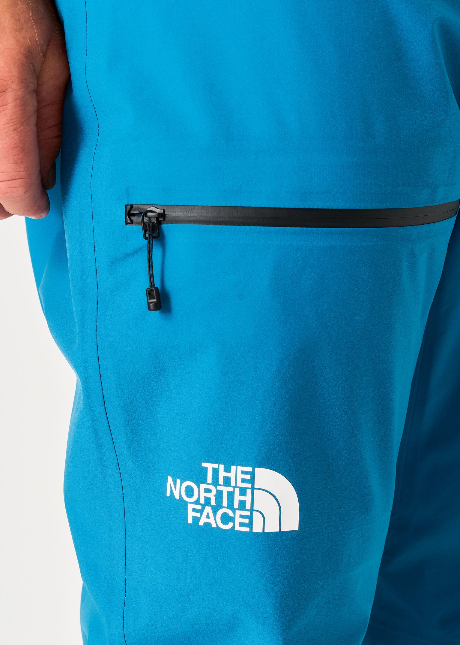 Zipped thigh pocket