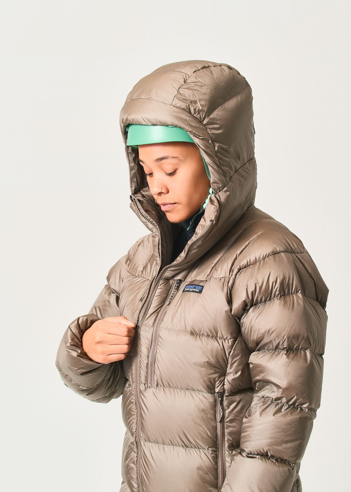 Adjustable helmet-compatible hood