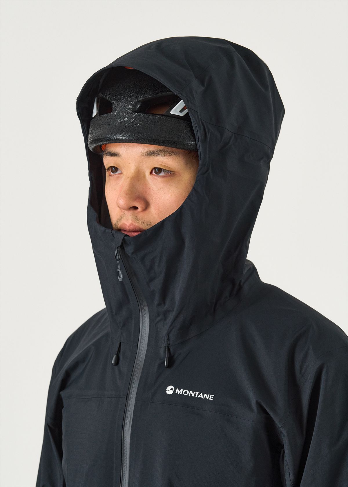 Adjustable helmet-compatible hood